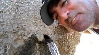 Drinking ice cold water from the village fountain