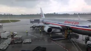 Loading an airplane in a storm timelapse