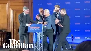 Protester interrupts Jacob Rees-Mogg to talk about 'characteristics of fascism'