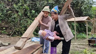 A 20-year-old single mother prepares wood to build a new house