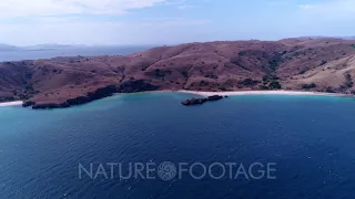 Drone footage of Komodo National Park, Indonesia with Padar island, its beautiful  beaches and dr...