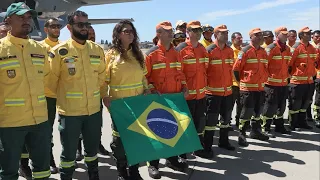 Brazilian firefighters arrive to fight 500 wildfires in British Columbia