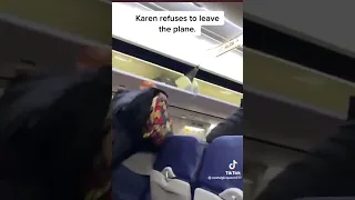 Karen refuses to leave plane.