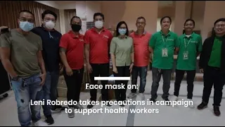 Face mask on: Robredo takes precautions in campaign to support health workers