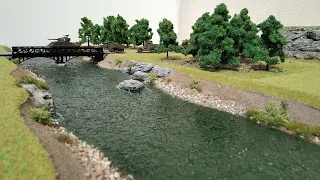 Make a model of a Second World War river and bridge, game table with WW2 figurines, 1/72