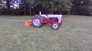 pulling stumps with a '53 Ford Golden Jubilee and mechanical advantage