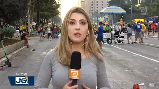 Cara arrota ao vivo no link da Globo na Paulista