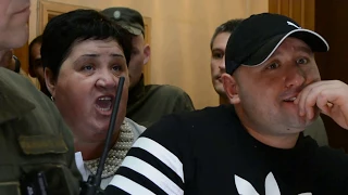 Ольга Луц и Юрий Дьяченко, которого не пускают на сессию Одесского городского совета