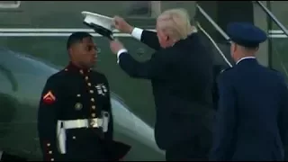 WATCH: Trump Puts Marine's Hat Back On After Wind Blows It Away