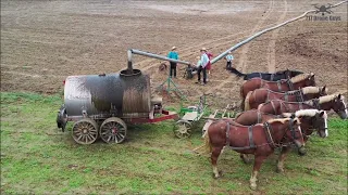 Epic 4K drone video of Amish children, 6 horses spreading liquid manure in Pennsylvania, USA.