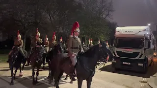 Troops return to barracks after midnight rehearsal for the Kings Coronation