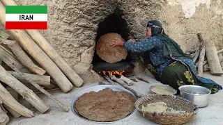Baking oak bread (Acorn) by a rural women in a traditional way/پخت سنتی نان بلوط توسط زن روستایی