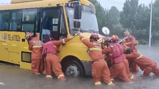 PLA and firefighters step forward as record rainfall hits central China's Henan