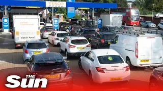 HUGE queues at petrol stations spark panic buying amid fuel shortage fears