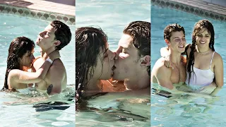 Camila Cabello wears a white swimsuit during a PDA-filled beach day with Shawn Mendes in Miami