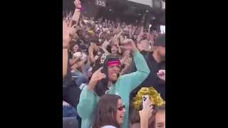 Justin and Hailey Bieber celebrating with crowd during MLS Finals 2022