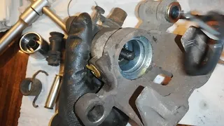 Dismantling and cleaning Mazda 626 rear caliper