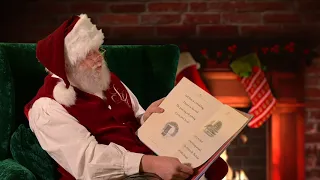 Bedtime stories with Santa featuring the book The Night Before Christmas.