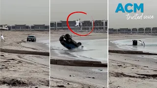 Man survives shocking car rollover on beach