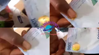 Nigerian Lady Shows How To Identify A Fake N1000 Naira Note