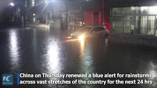 China renews blue alert for rainstorms