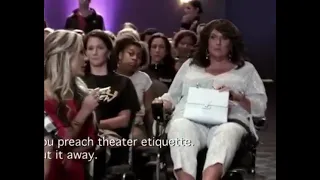 Abby Lee leaving the theater in her wheelchair