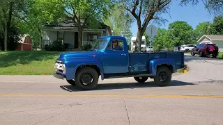 Cars leaving the 2021 Pickrell Picnic Car Show in Pickrell, Nebraska