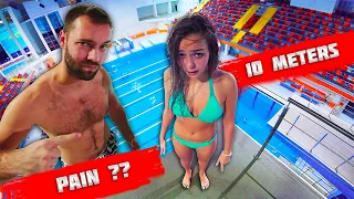 A REGULAR GIRL tried an OLYMPIC HEIGHT at the swimming pool