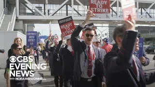 Thousands of flight attendants picket at major airports