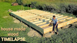 Construction of a wooden frame house far from the city / TIMELAPSE