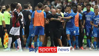 Nice vs Marseille abandoned after fans throw projectiles and invade the pitch