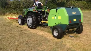 Zoomlion Tractor 50cv RK504 trabajando con rotoempacadora y rastrillo frontal doble montado.