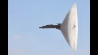 Navy F/A-18 Breaking The Sound Barrier Over Water