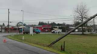 Maintenance truck hits power pole, power lines fall across vehicles in North Plains