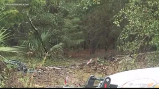 Body found inside burning SUV in the woods on the Northside