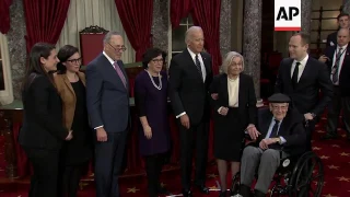 Biden Snaps Selfies, Blows Kisses at Swearing In