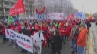 Belgian workers protest conditions, mandatory jabs