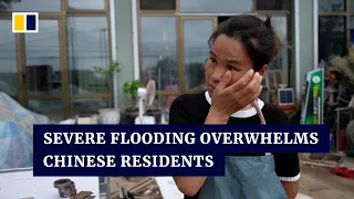 Residents of flood-ravaged Chinese city take stock of losses, hope for compensation