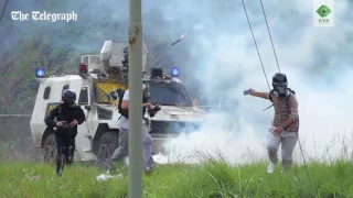 Venezuela crisis: protesters hurl 'Molotov cocktails' at armoured tank