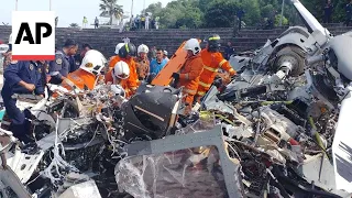 Two Malaysian military helicopters collide and crash in training, killing all on board