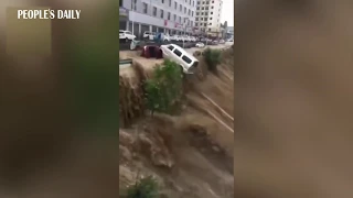 Vehicles are swept away by heavy flood