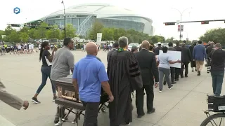 Activists protest Botham Jean shooting outside AT&T Stadium