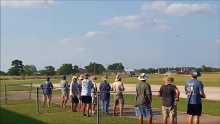 15 RC WARBIRDS UP IN THE AIR DOING HIS TIGHT FORMATION DOING HIGH SPEED LOW PASSES AT THE SAME TIME