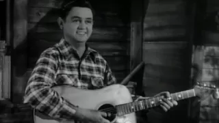 Merle Travis performs Nine Pound Hammer and Mus'rat.