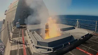 Littoral Combat Ship 🇺🇸USS Montgomery fires Longbow Hellfire missiles against a land target.