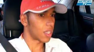 Lewis Hamilton talking to Niki Lauda driving in the Mercedes