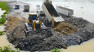 Amazingly Powerful Machines Bulldozer Stone pushing into Water and Stone Unloading from Dump Truck