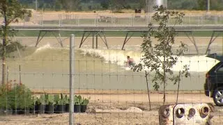 Surfers test the waters at NLand Surf Park outside of Austin