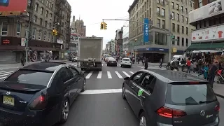 Lane Splitting a traffic jam on Canal Street in New York City