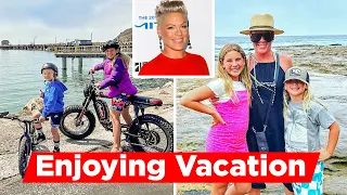 Pink Enjoying Family Vacation On Australia's Bondi Beach